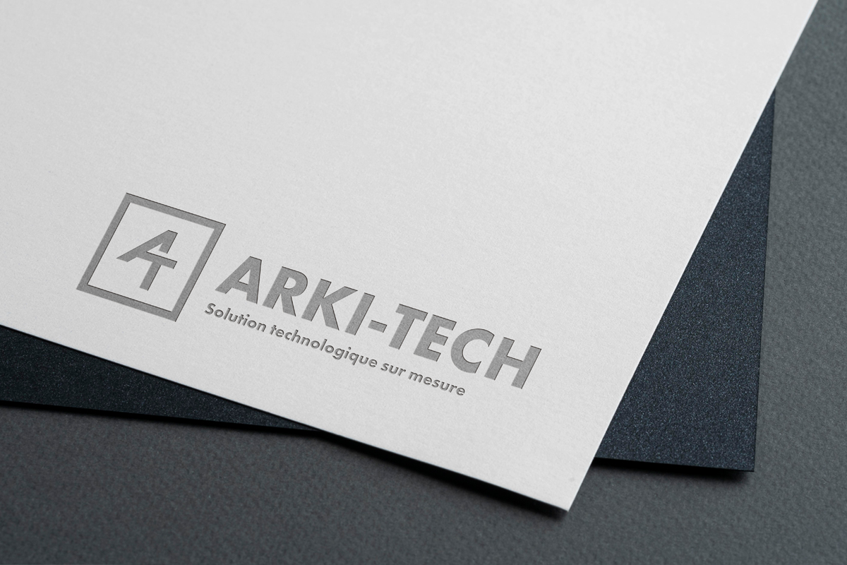 Logo Arki-Techgris sur papier blanc mockup